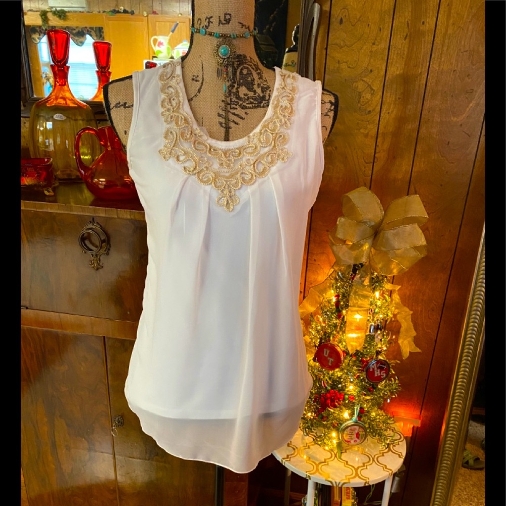 Vintage Nishangnvyl tired sleeveless blouse.